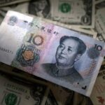 China’s yuan hits 3-year high, stocks dip, as investors await details from Trump-Xi summit