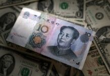 China’s yuan hits 3-year high, stocks dip, as investors await details from Trump-Xi summit