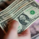 Dollar climbs for fifth straight day as Treasury yields surge