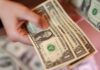 Dollar edges up as investors weigh Iran peace hopes against Fed rate outlook