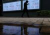Global bonds tumble as flaring inflation spooks investors
