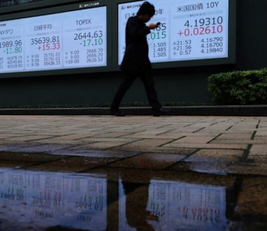 Global bonds tumble as flaring inflation spooks investors