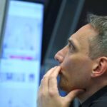 Global stocks surge and oil slides on Iran peace deal report