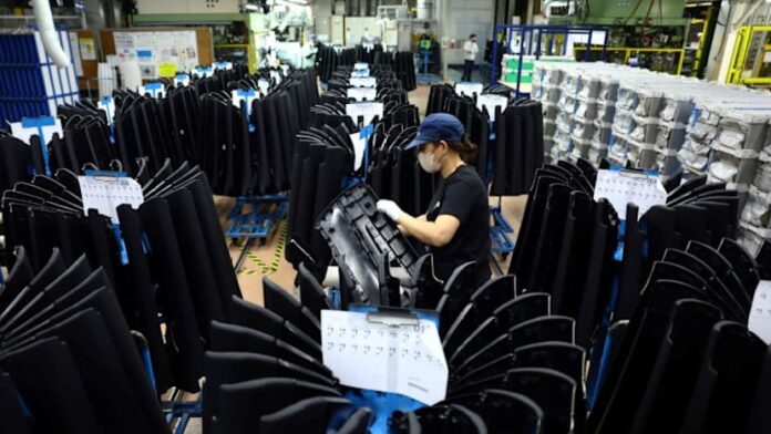 Japan manufacturers' mood edges up in May, services sector slips: Reuters poll