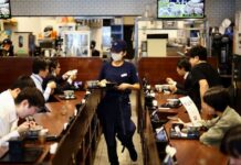 Japan’s factory activity growth hits 4-year high on stockpiling, PMI shows