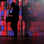 Japan’s Nikkei surges past 61,000 for first time on earnings, Mideast optimism