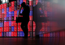 Japan’s Nikkei surges past 61,000 for first time on earnings, Mideast optimism