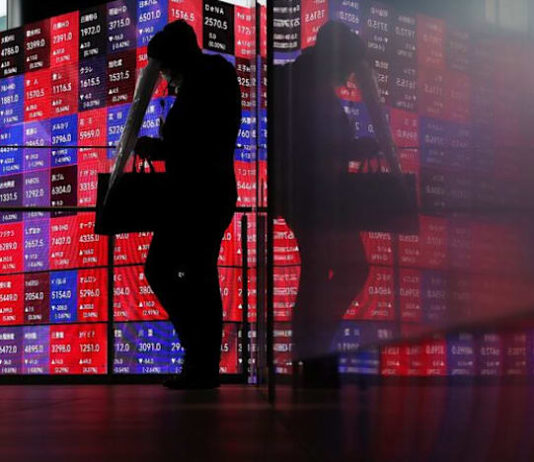 Japan’s Nikkei surges past 61,000 for first time on earnings, Mideast optimism
