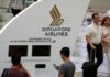Singapore Airlines flags surging fuel costs; annual profit halves on one-offs