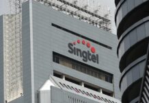 Singtel logs 12% rise in annual earnings helped by regional associates