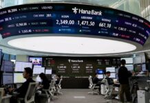 South Korea’s KOSPI share index tops 7,000 for first time