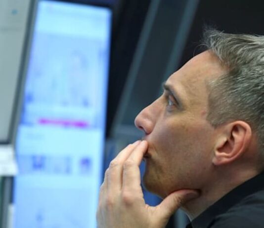 Stocks gain and oil slides after Iran peace deal report