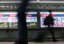 Wall Street follows global stocks higher, crude prices ease on potential US-Iran truce extension