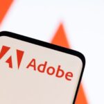 Adobe raises annual revenue forecast, CFO to exit