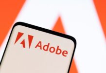 Adobe raises annual revenue forecast, CFO to exit