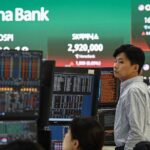 Asian stocks fluctuate after Wall Street sell-off, crude holds losses on peace talks