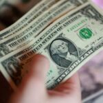 Dollar poised for best month in nearly a year; eyes on jobs data, Gulf tension
