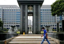 Indonesia raises rates in surprise move to support sinking rupiah