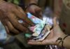 Indonesian central bank says governor briefs foreign investors following surprise rate hike