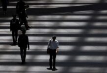 Japan moves toward first-ever consumption tax cut, adds to fiscal strain
