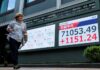 Japan, South Korea stocks hit records as oil prices fall
