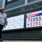 Japan, South Korea stocks hit records as oil prices fall