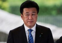 Japan will build economic structure resilient to forex swings, govt spokesman says