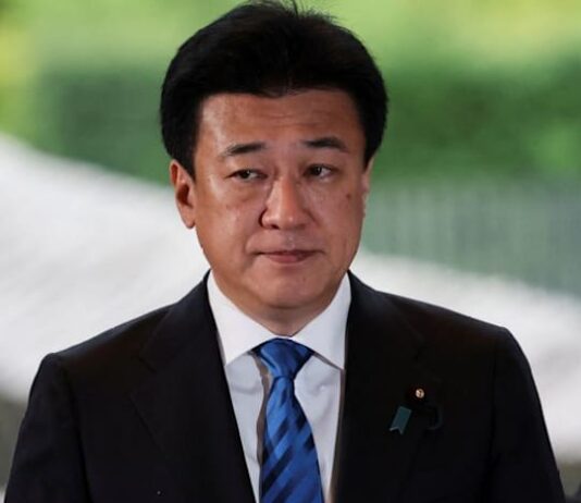 Japan will build economic structure resilient to forex swings, govt spokesman says