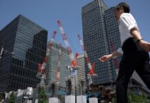 Japan’s economy cools on weak capex in Q1, revised data shows