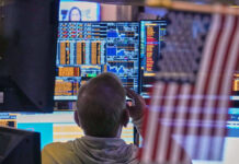 Oil drops, stocks mostly higher despite AI concerns