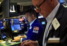 Stocks and oil prices edge up with eyes on Iran; yen touches 40-year low vs dollar