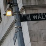 Stocks hold near record highs as AI optimism trumps Iran tensions