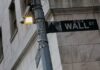 Stocks steady at record highs as AI optimism trumps Iran tensions