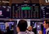 World stocks edge lower as tech selloff drags markets
