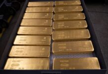 Gold edges lower ahead of Fed decision on interest rates