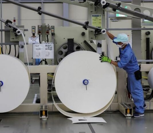 Japan manufacturers stay upbeat on chip demand, services hit by costs