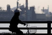 Japan’s factory activity stays firm as output surges in July, PMI shows