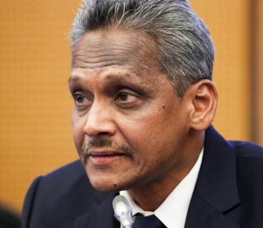 Malaysian economy on track for 4% to 5% growth, central bank governor says