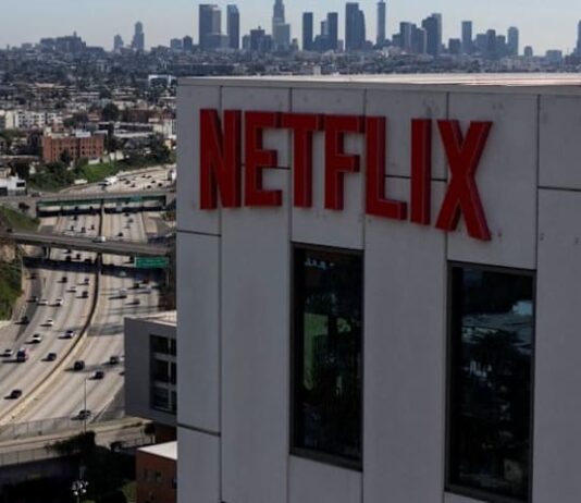 Netflix tumbles as slowing growth, less viewership data spook investors