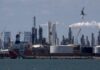 Oil prices settle at pre-Iran war levels as crude output grows