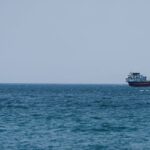 Oil prices slip as tankers continue to ply Middle East conflict zones