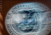 US Department of Homeland Security says it is probing a cyber breach at information-sharing network