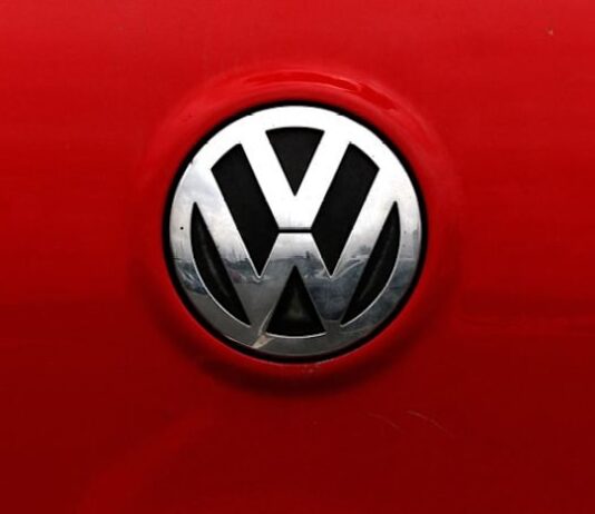 Volkswagen profit plunges as carmaker weighs mass job cuts