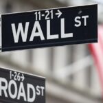 Wall Street closes down sharply after Fed holds rates unchanged