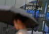 Asian chip firms lifted by Nvidia forecast but broader markets struggle