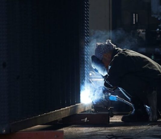 Japan’s factory output surges to near 12-year high in July, PMI shows