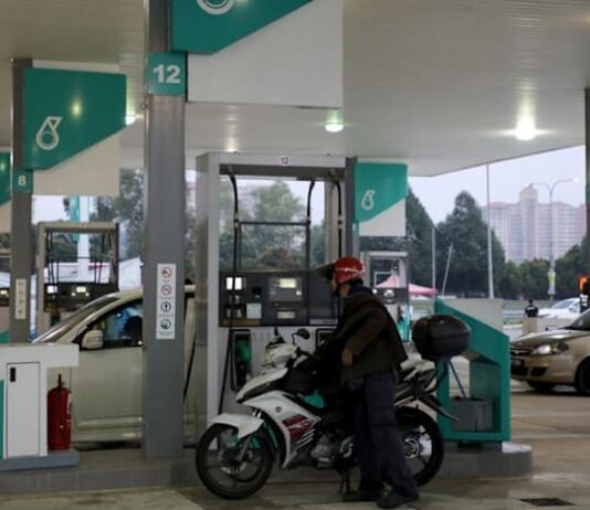 Malaysia to reinstate 300-litre monthly limit per citizen for RON95 transport fuel, PM says