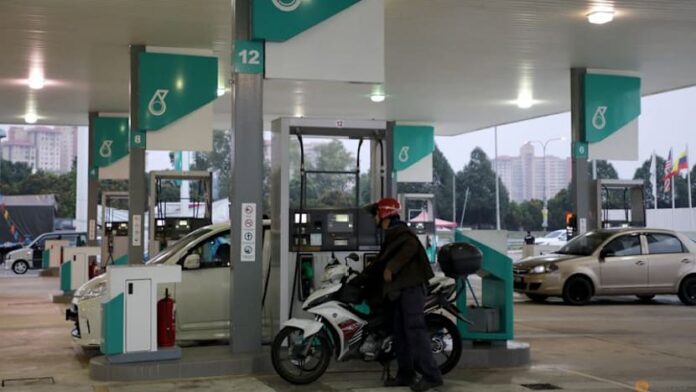 Malaysia to reinstate 300-litre monthly limit per citizen for RON95 transport fuel, PM says