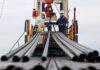Oil climbs over $1 on tanker attacks, no progrees on peace