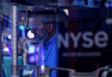 Oil dips on demand forecasts, global equities gain